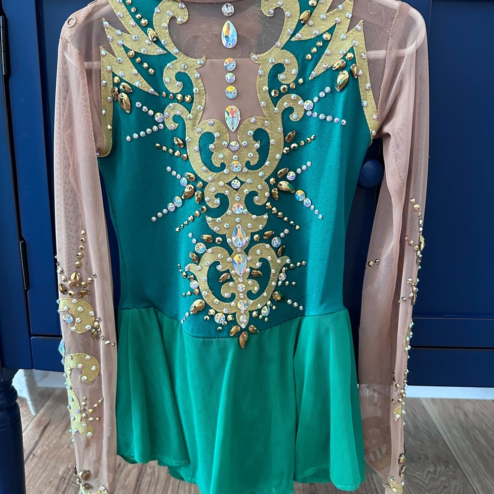 Figure Skating Dress. Beautiful emerald and gold dress.